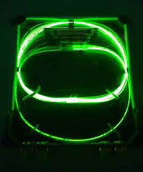 Fiber Lasers with spectral broadening well beyond gain bandwidth