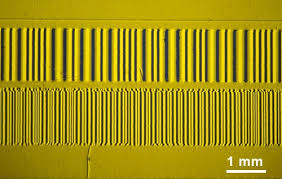 Organic magnetoelectroluminescence for transduction between magnetic and optical information